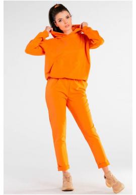 Pohodlné dámske tepláky oranžovej farby