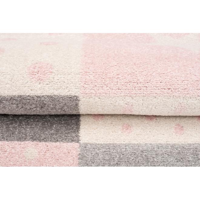 Ružový koberec so vzormi