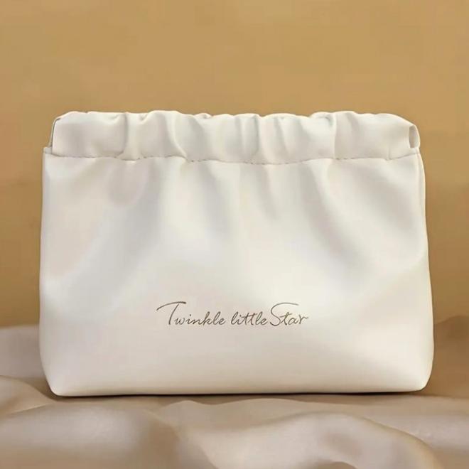 Kožená béžová kozmetická taška - M