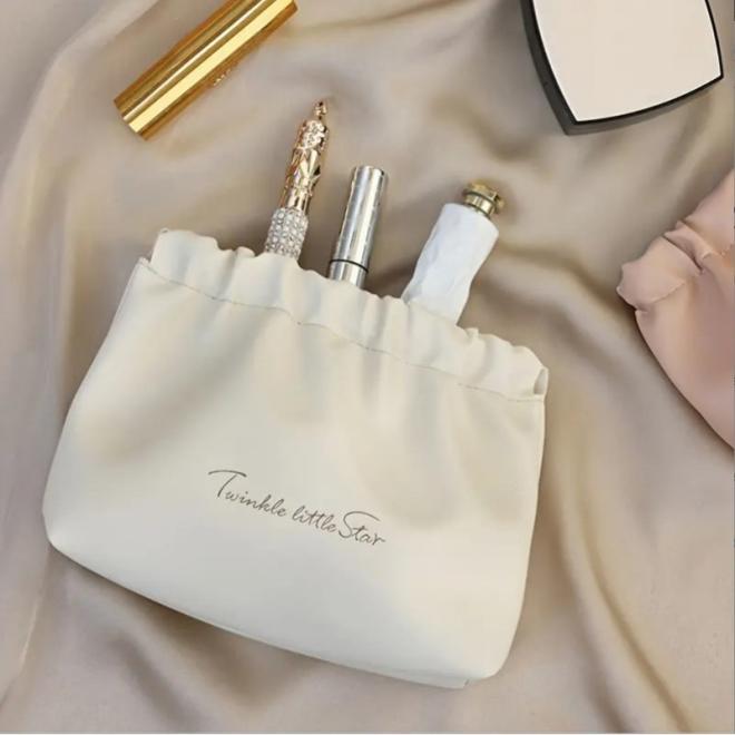 Kožená béžová kozmetická taška - S