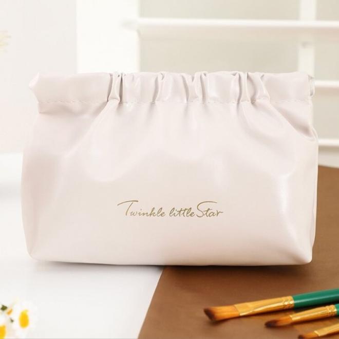 Kožená béžová kozmetická taška - S