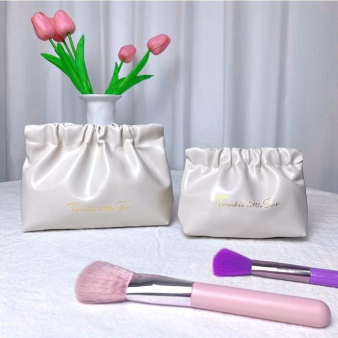 Kožená béžová kozmetická taška - S